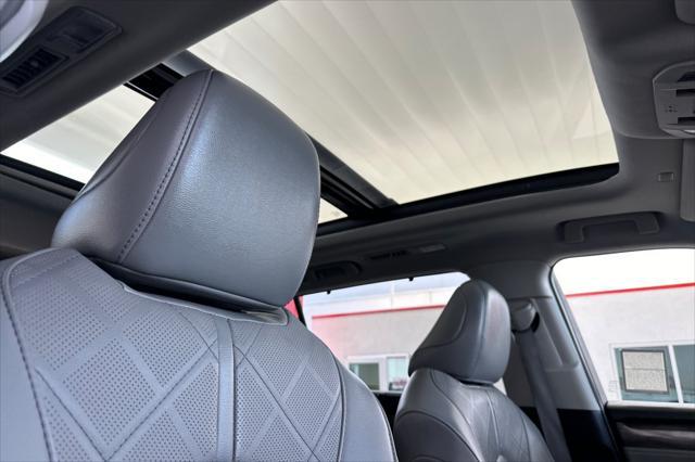 used 2021 Toyota Highlander Hybrid car, priced at $39,025