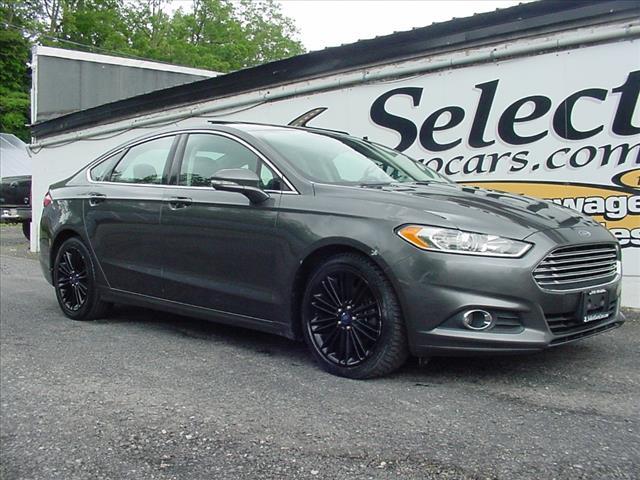 used 2016 Ford Fusion car, priced at $7,998