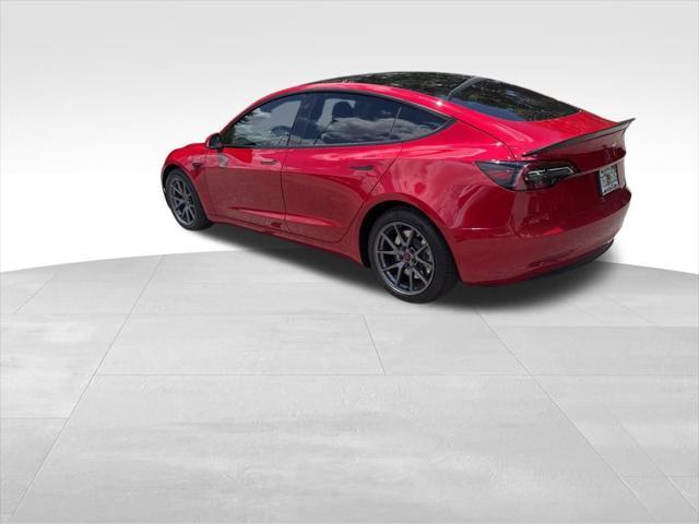 used 2023 Tesla Model 3 car, priced at $25,700