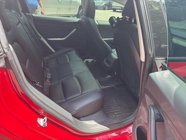 used 2023 Tesla Model 3 car, priced at $25,700