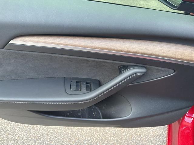 used 2023 Tesla Model 3 car, priced at $25,700