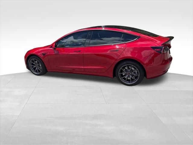 used 2023 Tesla Model 3 car, priced at $25,700