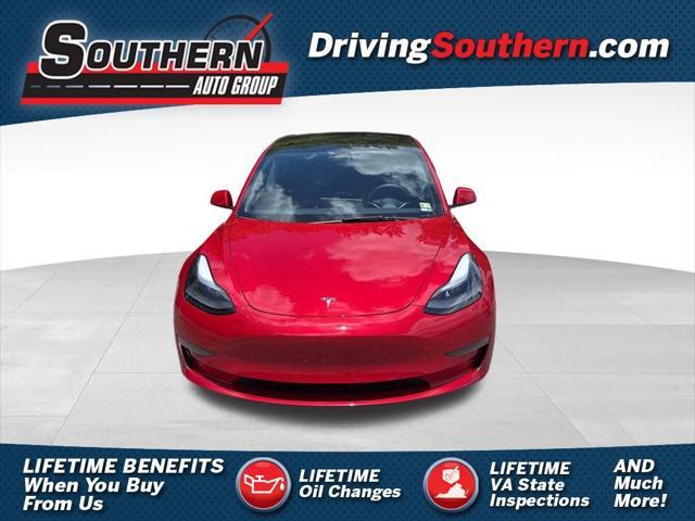 used 2023 Tesla Model 3 car, priced at $25,700