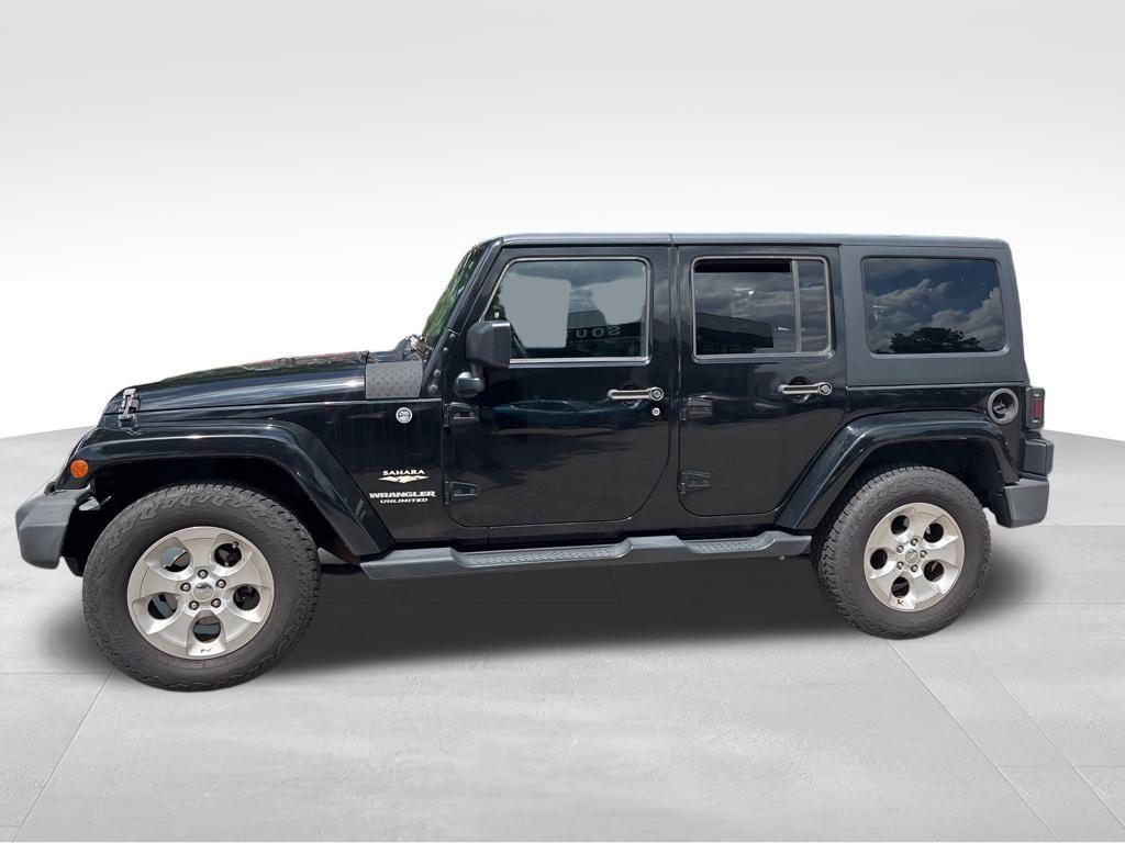 used 2015 Jeep Wrangler Unlimited car, priced at $17,532