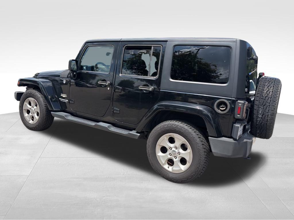 used 2015 Jeep Wrangler Unlimited car, priced at $17,532