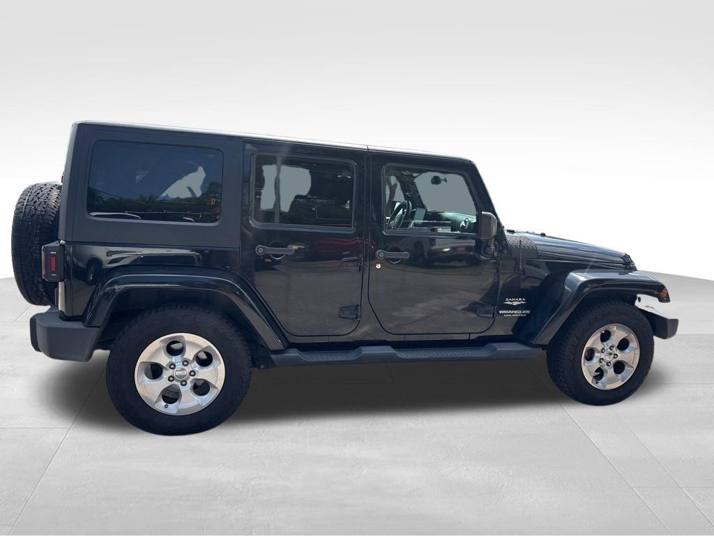 used 2015 Jeep Wrangler Unlimited car, priced at $17,532