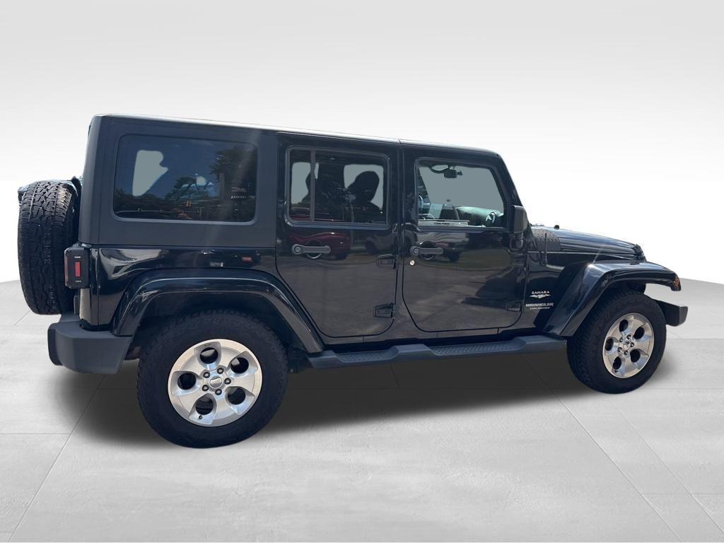 used 2015 Jeep Wrangler Unlimited car, priced at $17,532
