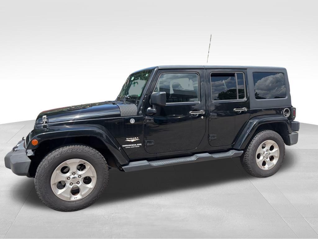 used 2015 Jeep Wrangler Unlimited car, priced at $17,532