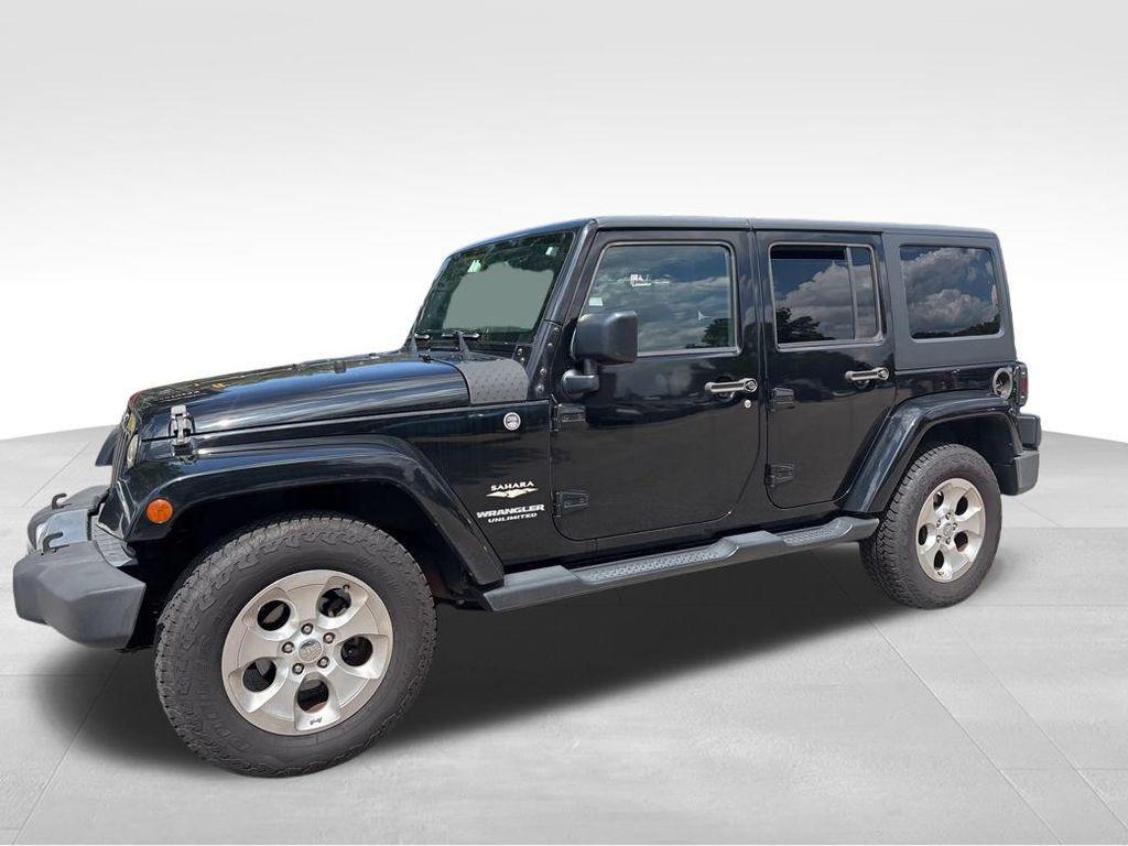 used 2015 Jeep Wrangler Unlimited car, priced at $17,532