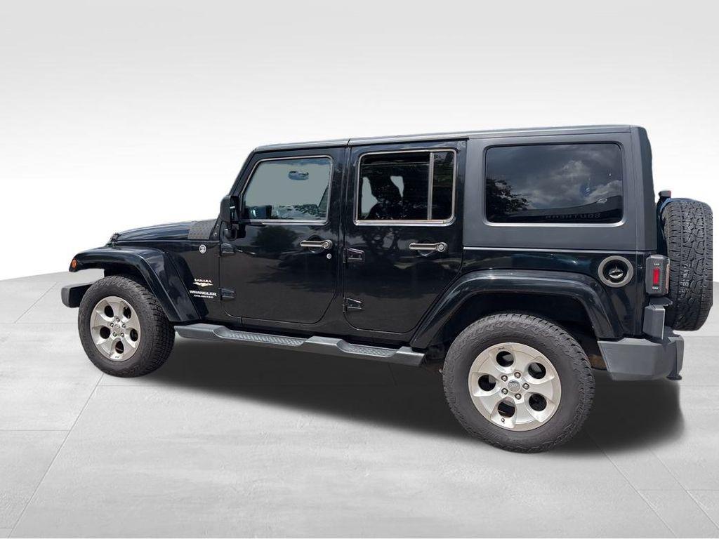 used 2015 Jeep Wrangler Unlimited car, priced at $17,532