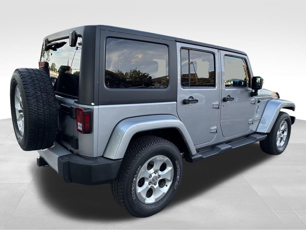 used 2013 Jeep Wrangler Unlimited car, priced at $11,586