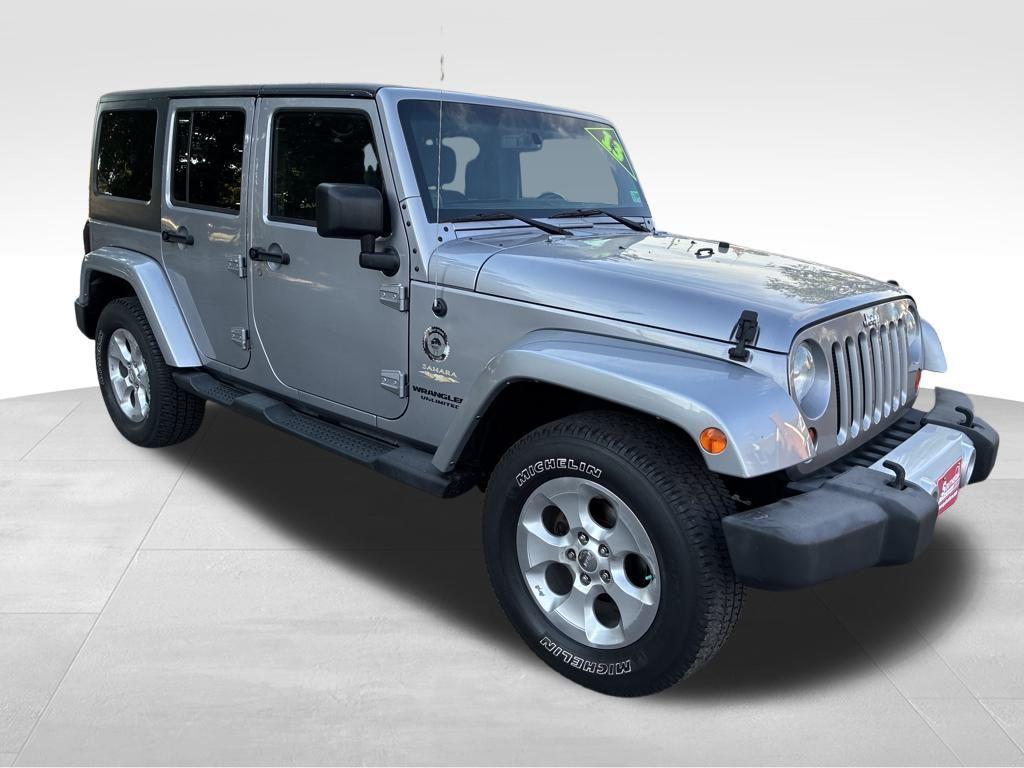 used 2013 Jeep Wrangler Unlimited car, priced at $11,586