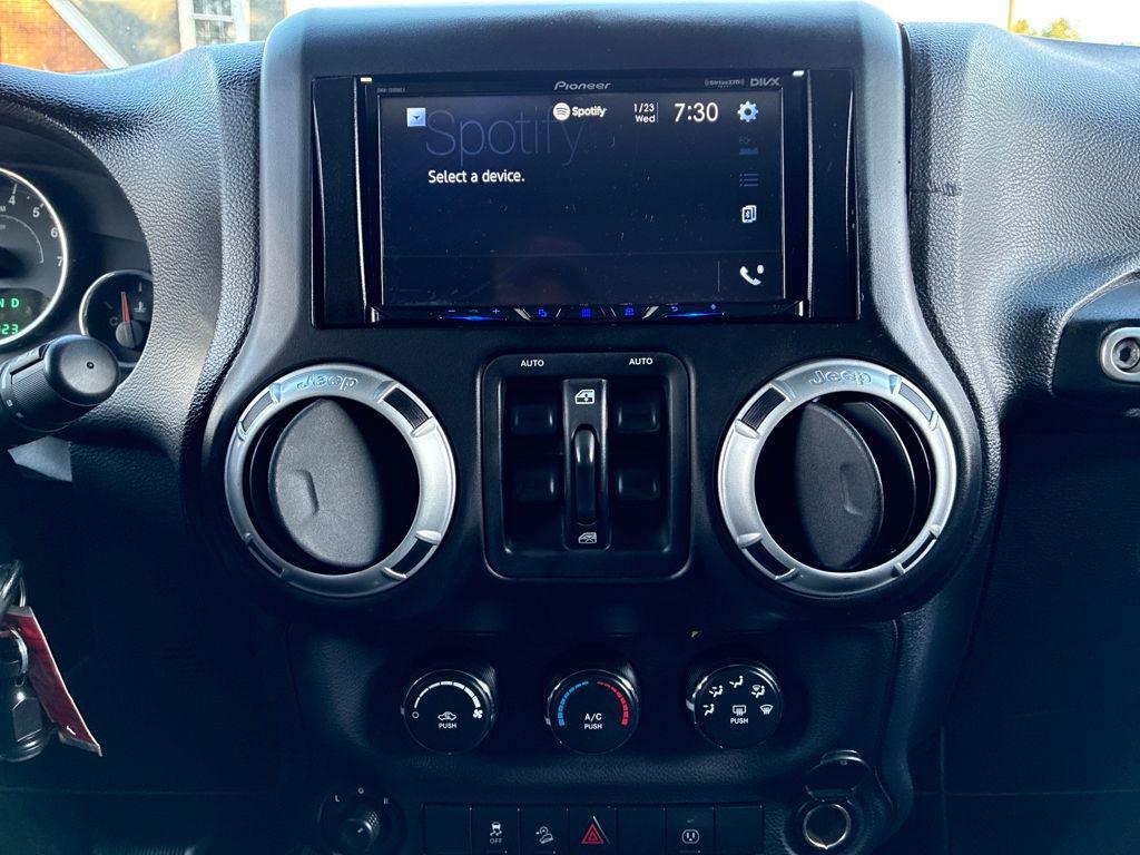 used 2013 Jeep Wrangler Unlimited car, priced at $11,586