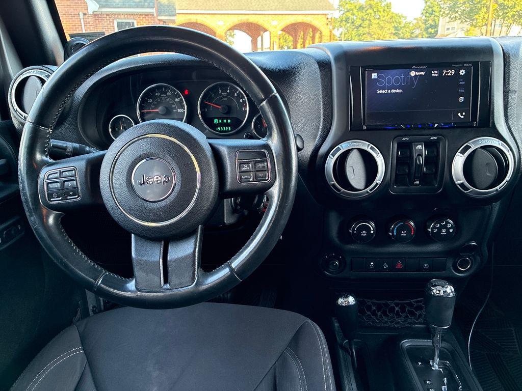 used 2013 Jeep Wrangler Unlimited car, priced at $11,586