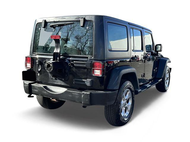 used 2013 Jeep Wrangler Unlimited car, priced at $14,741