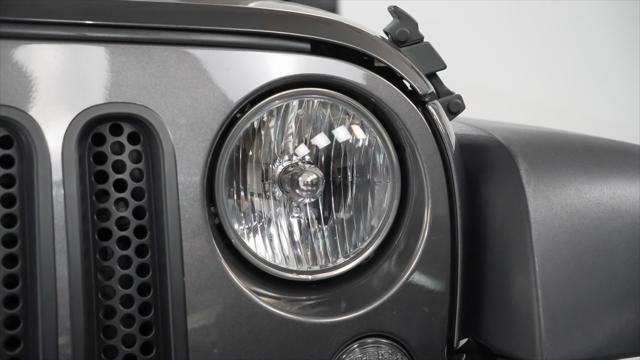 used 2018 Jeep Wrangler JK Unlimited car, priced at $21,400