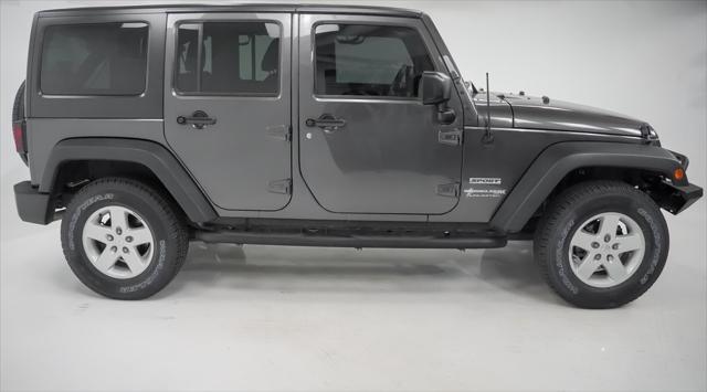 used 2018 Jeep Wrangler JK Unlimited car, priced at $21,400