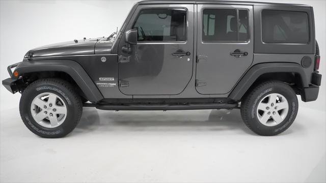 used 2018 Jeep Wrangler JK Unlimited car, priced at $21,400
