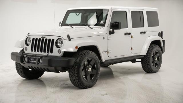 used 2015 Jeep Wrangler Unlimited car, priced at $21,991