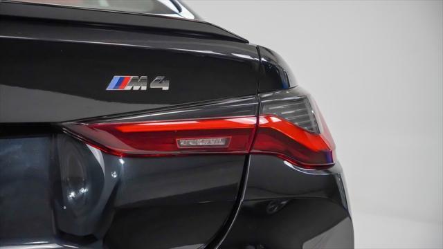 used 2021 BMW M4 car, priced at $61,900