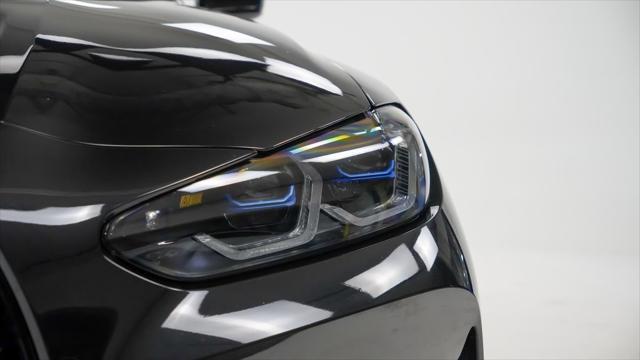 used 2021 BMW M4 car, priced at $61,900