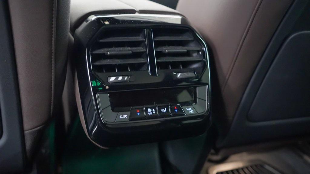 used 2024 BMW iX car, priced at $59,991