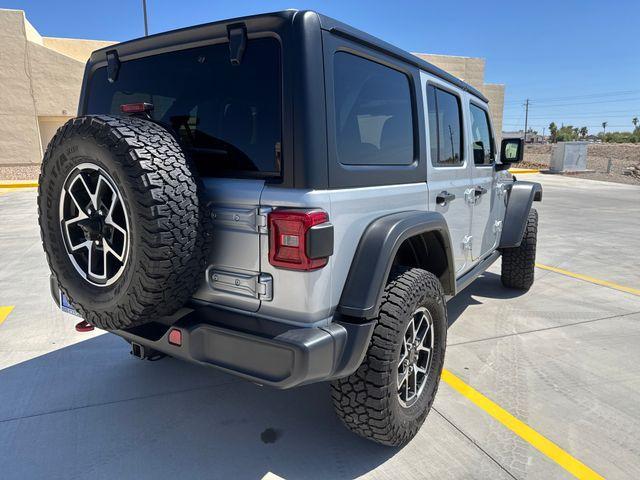 used 2024 Jeep Wrangler car, priced at $42,868