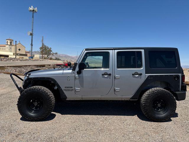 used 2015 Jeep Wrangler Unlimited car, priced at $21,968