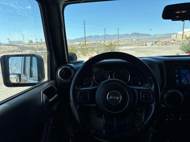 used 2015 Jeep Wrangler Unlimited car, priced at $21,968