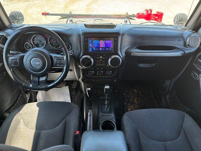 used 2015 Jeep Wrangler Unlimited car, priced at $21,968