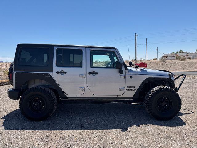 used 2015 Jeep Wrangler Unlimited car, priced at $21,968