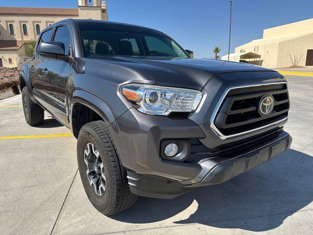 used 2020 Toyota Tacoma car, priced at $26,868