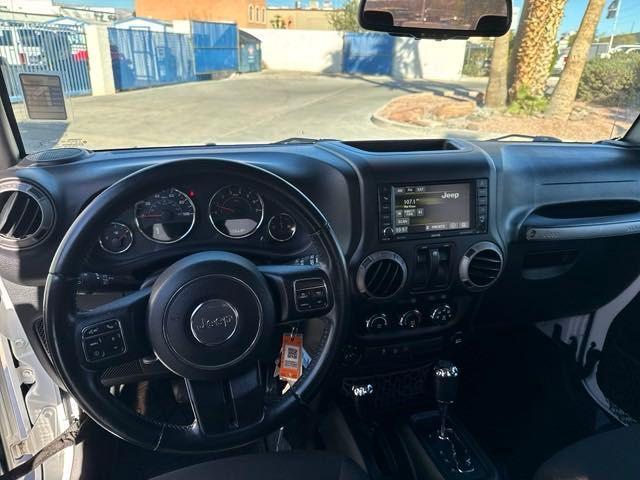 used 2016 Jeep Wrangler car, priced at $23,995