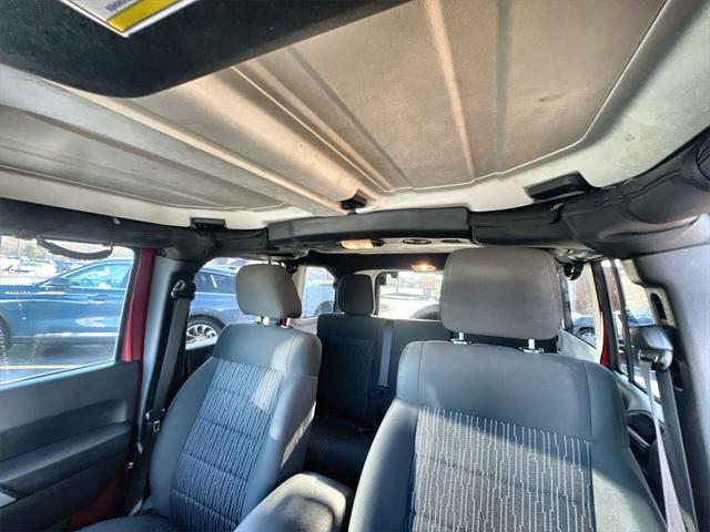 used 2012 Jeep Wrangler Unlimited car, priced at $13,918