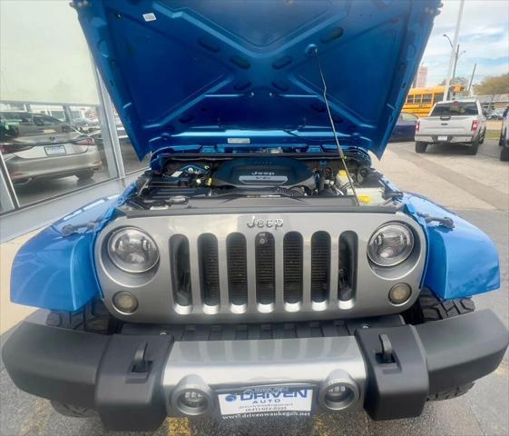 used 2014 Jeep Wrangler Unlimited car, priced at $19,500