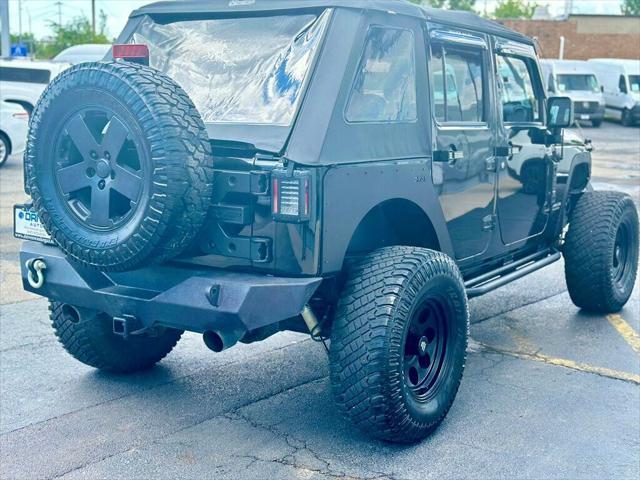 used 2015 Jeep Wrangler Unlimited car, priced at $20,980