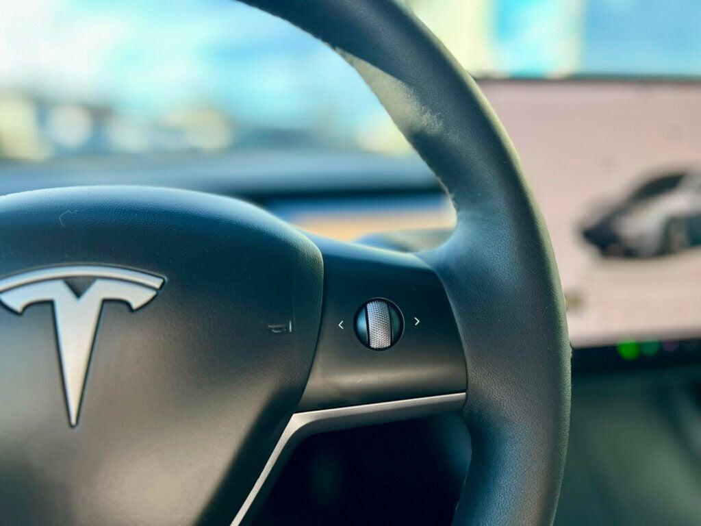 used 2023 Tesla Model 3 car, priced at $27,980