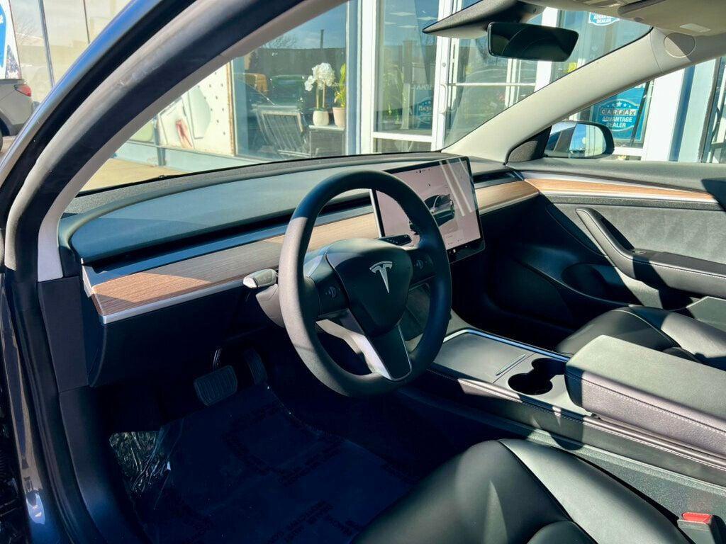 used 2023 Tesla Model 3 car, priced at $27,980