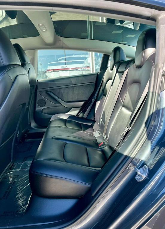 used 2023 Tesla Model 3 car, priced at $27,980