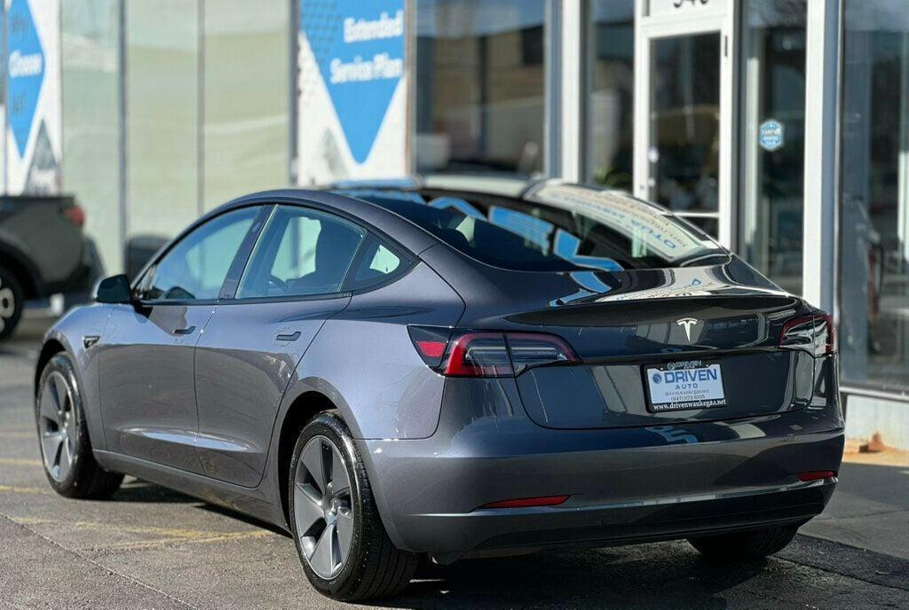 used 2023 Tesla Model 3 car, priced at $27,980