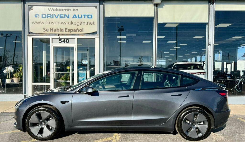 used 2023 Tesla Model 3 car, priced at $27,980