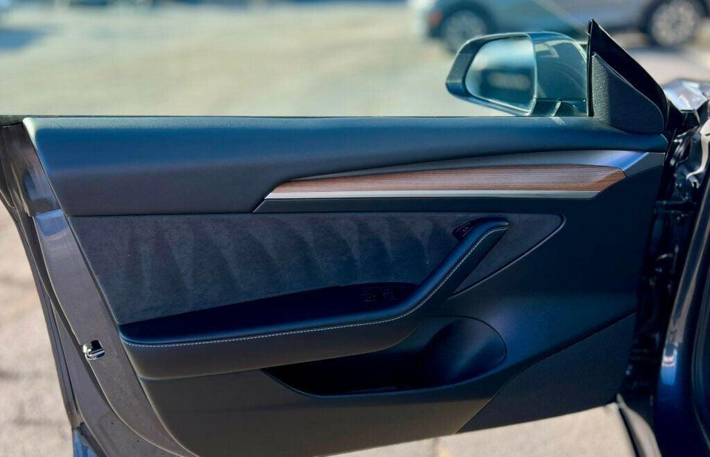 used 2023 Tesla Model 3 car, priced at $27,980