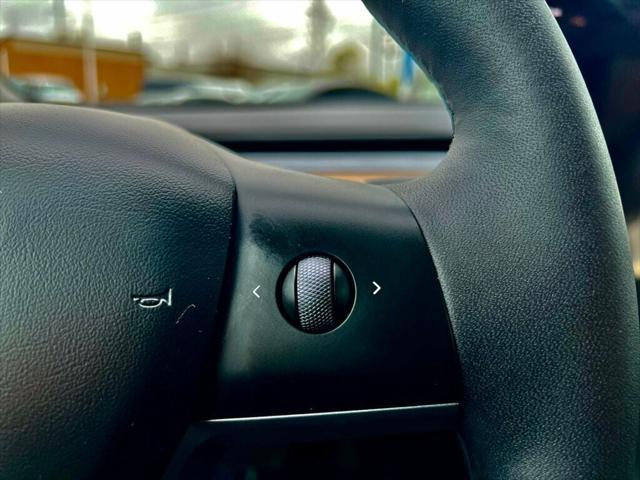 used 2023 Tesla Model 3 car, priced at $26,980