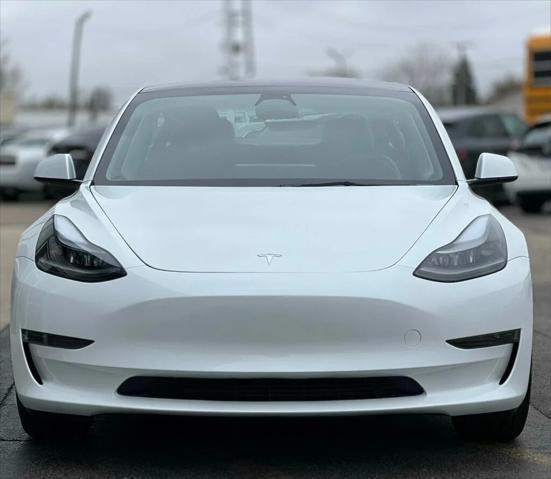 used 2023 Tesla Model 3 car, priced at $26,980