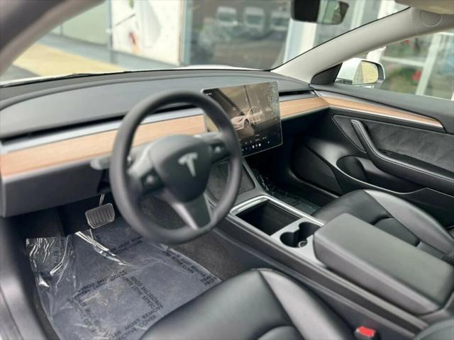 used 2023 Tesla Model 3 car, priced at $26,980