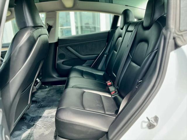 used 2023 Tesla Model 3 car, priced at $20,980