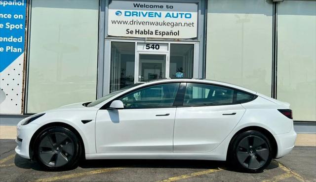 used 2023 Tesla Model 3 car, priced at $20,980