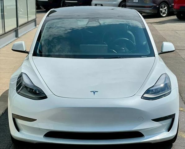 used 2023 Tesla Model 3 car, priced at $20,980