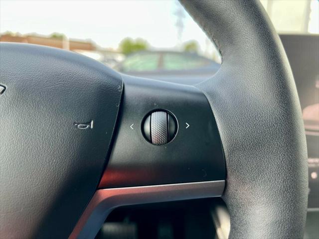 used 2023 Tesla Model 3 car, priced at $20,980