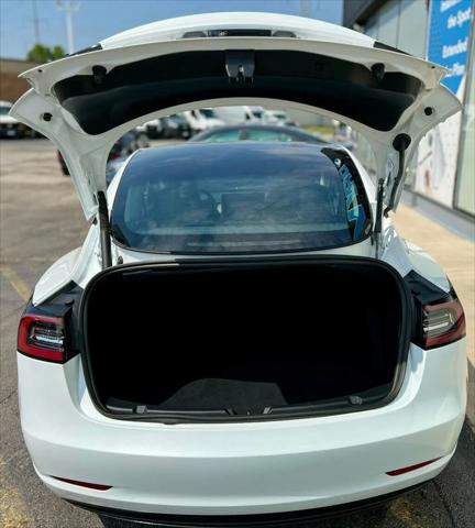 used 2023 Tesla Model 3 car, priced at $20,980